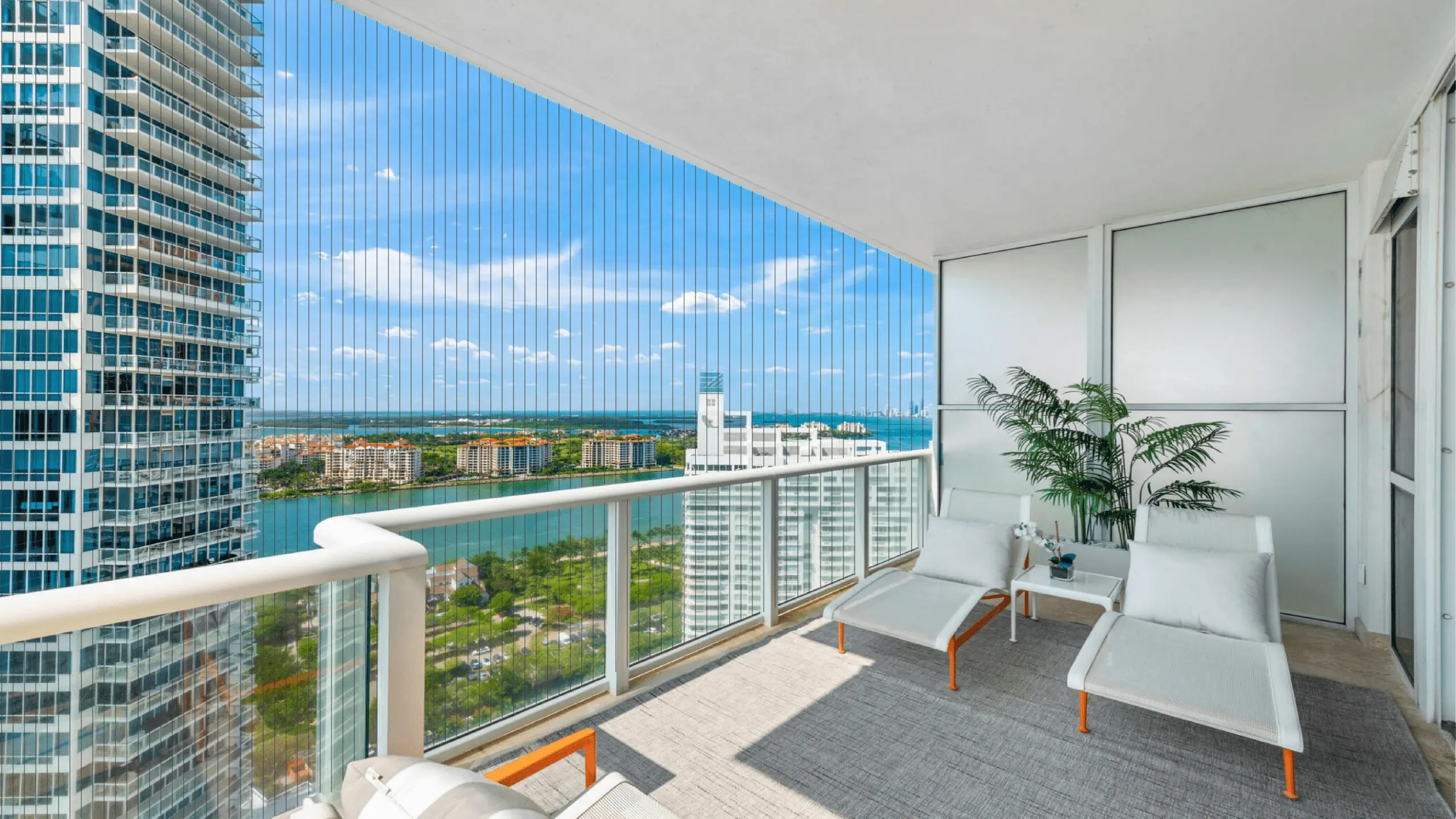 Invisible grill installed on an apartment balcony for safety
