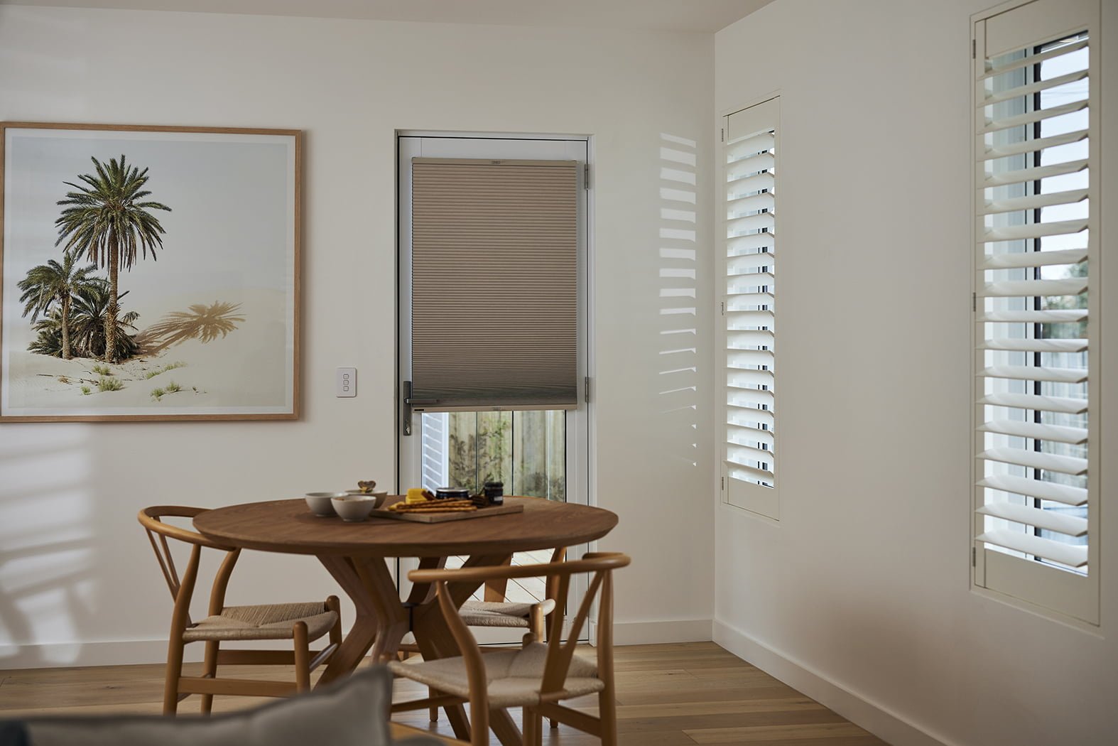PVC folding door separating two living spaces